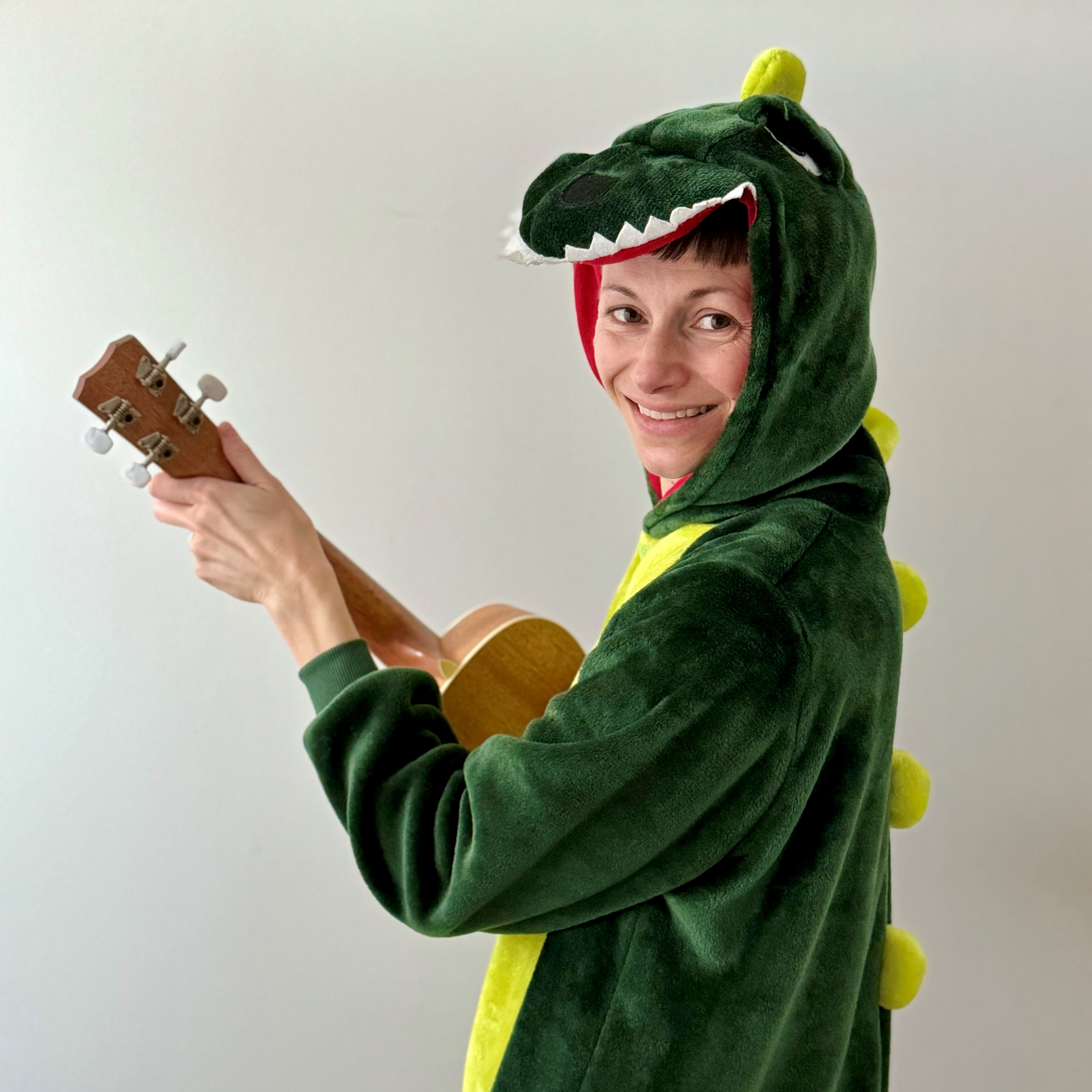 Ms. Christina in a dinosaur costume