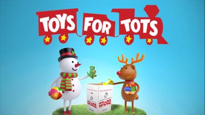 Toys for Tots logo with image of a snowman and a reindeer adding toys to a donation box