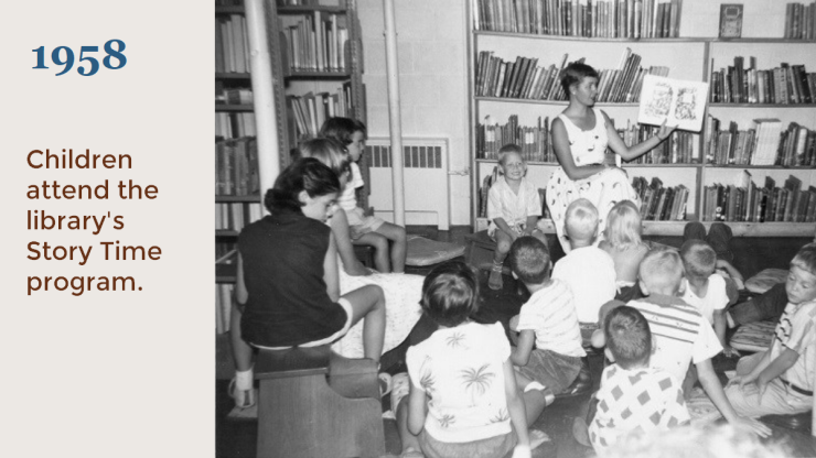 1958 Children attend the library's story time program. 